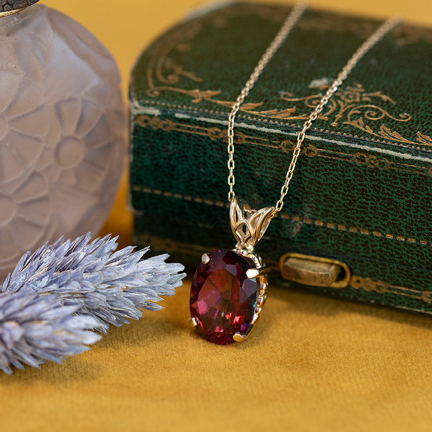 Gouden hanger met mystieke topaas 14 kt