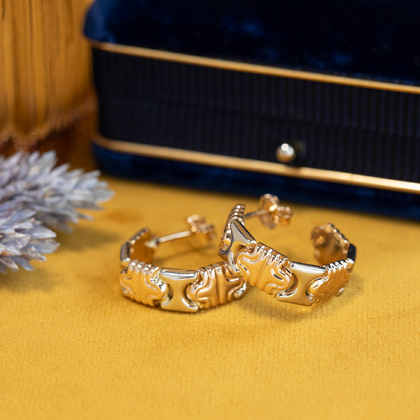 Bicolour gouden oorstekers 14 kt