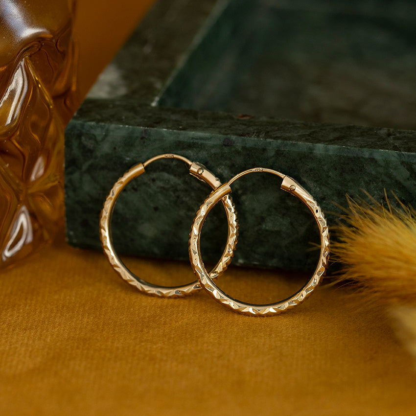 14 kt gold fantasy hoop earrings