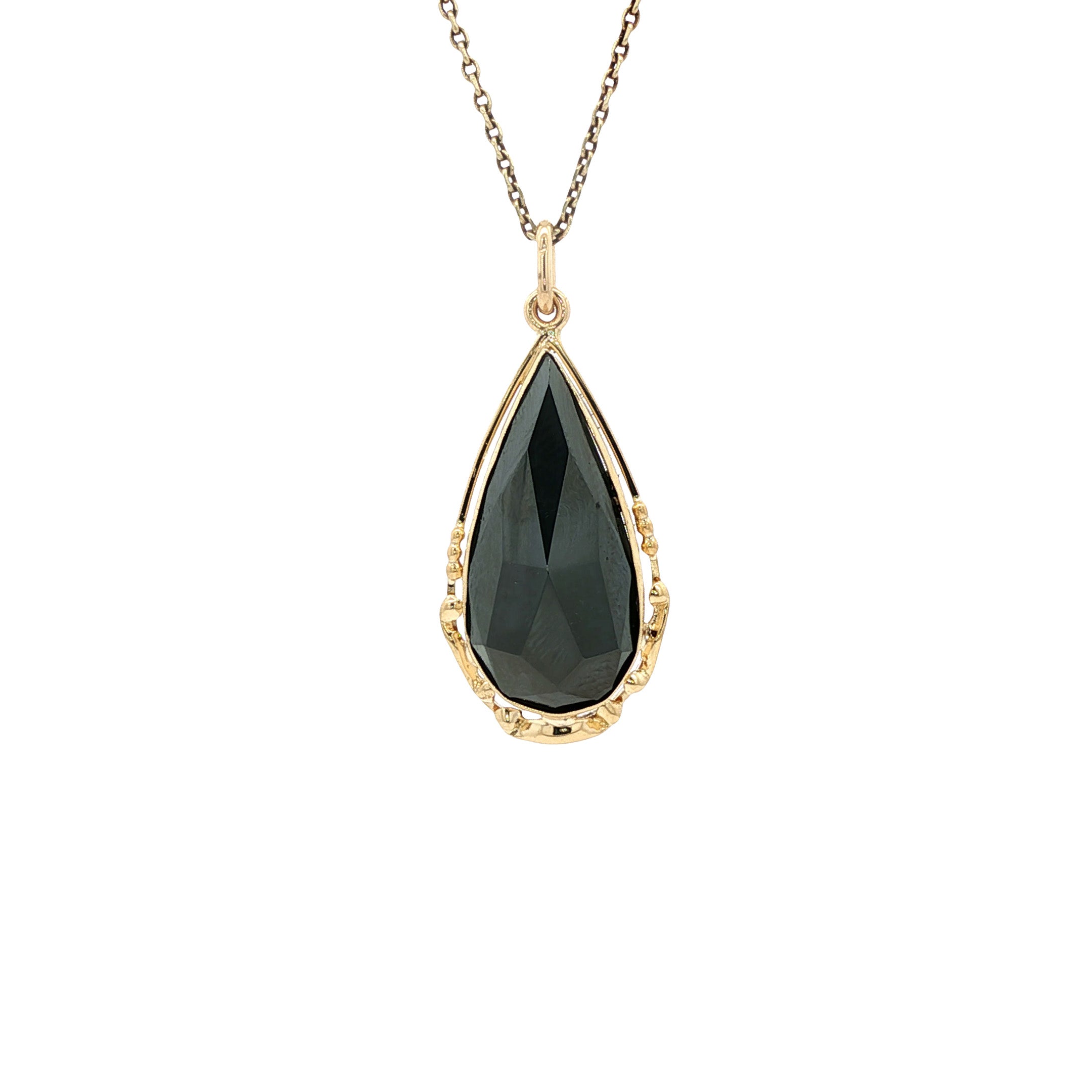 Gold pendant with hematite, 14 kt