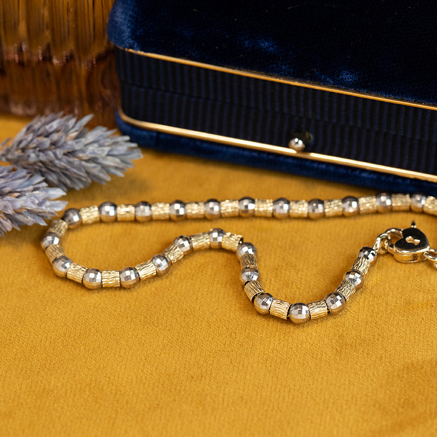 Bicolour gouden fantasie armband 14 kt