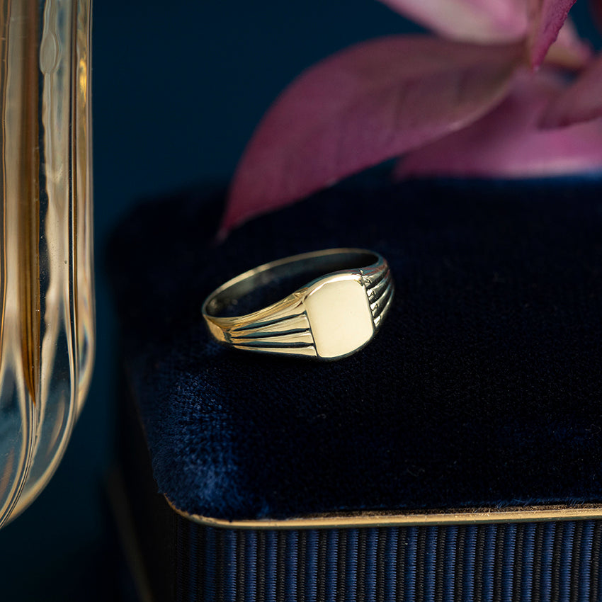 Gouden kinder zegelring 14 kt