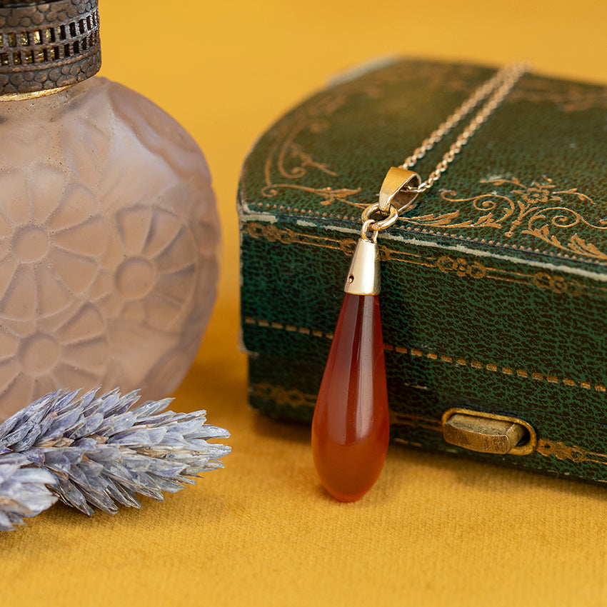 Gouden hanger met streepagaat 14 kt