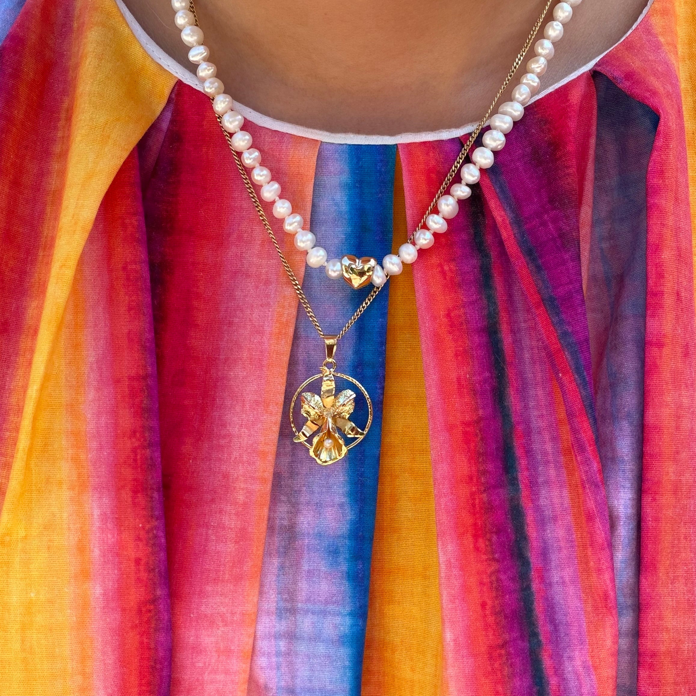 Vintage parel collier met gouden hart 14 kt