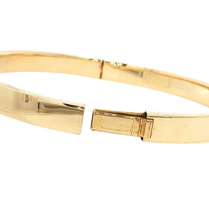 Smooth 14 kt gold bangle