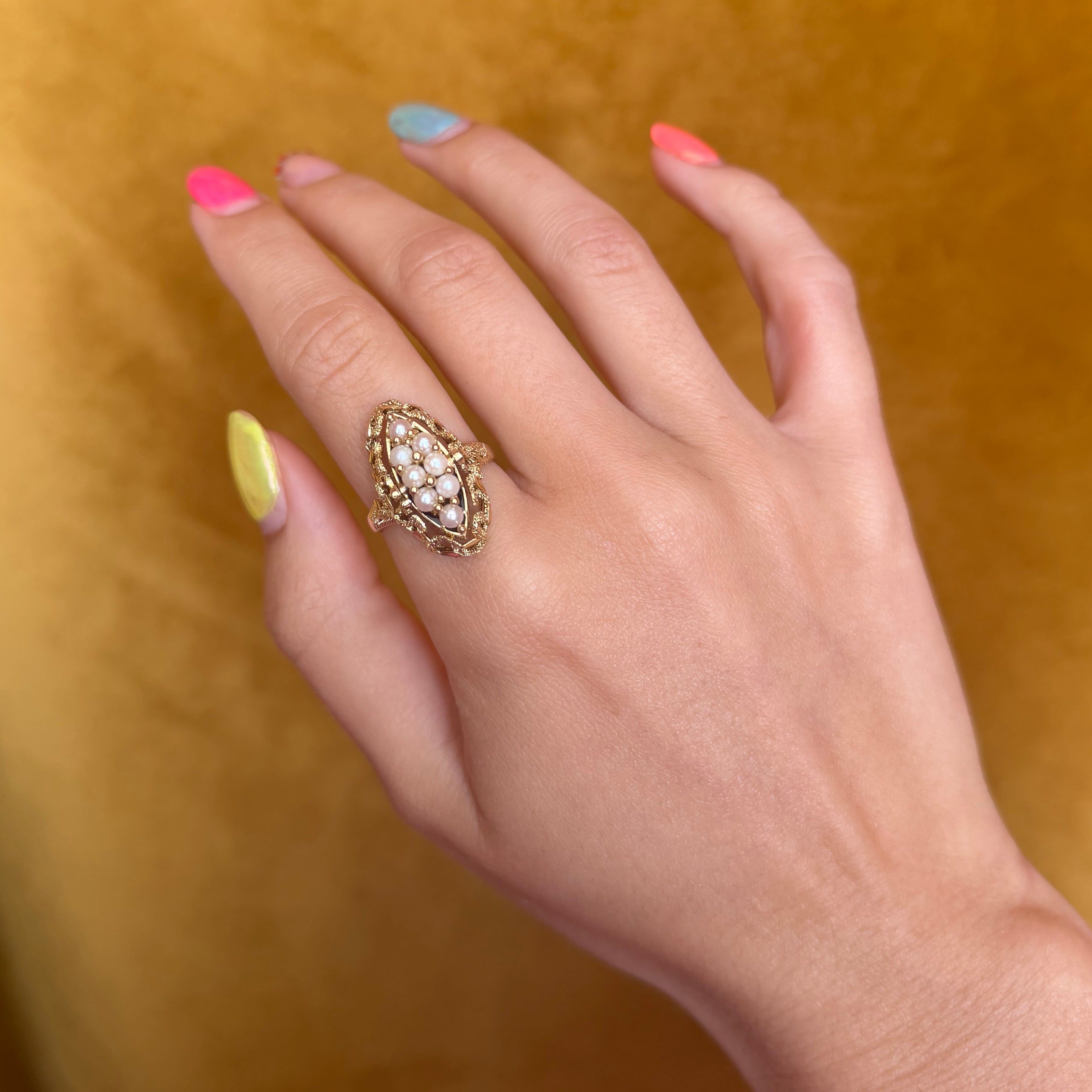 Gouden vintage ring met parel en amethist 14 kt