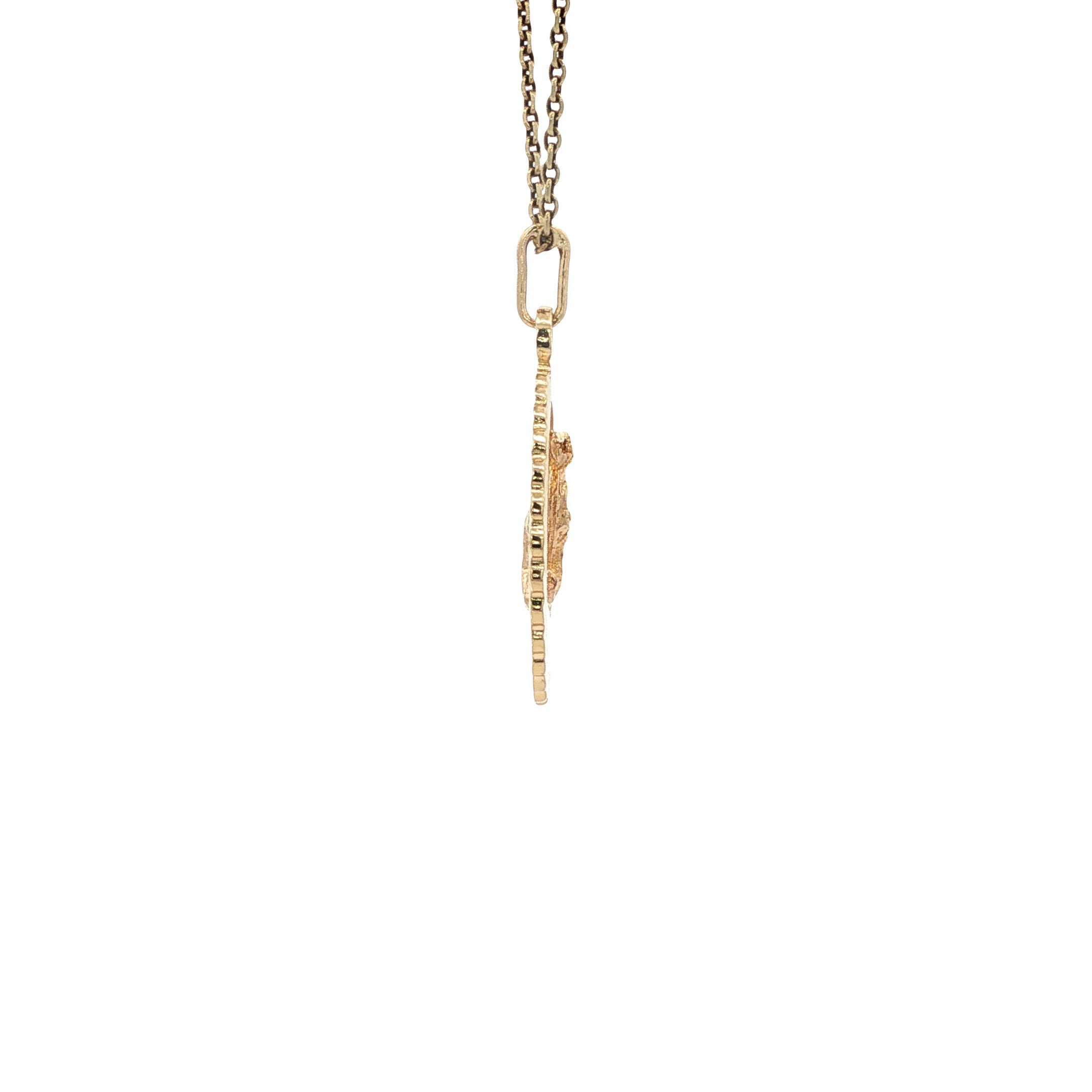 14 kt gold ram pendant