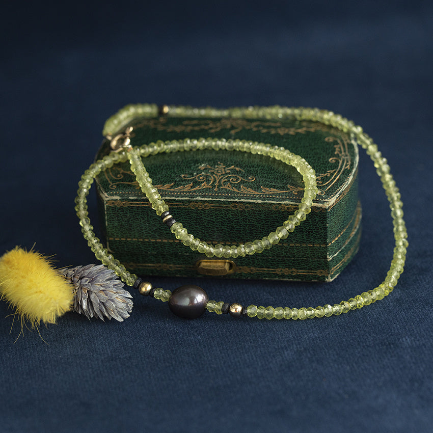 Peridot necklace with pearl and 14 kt gold clasp
