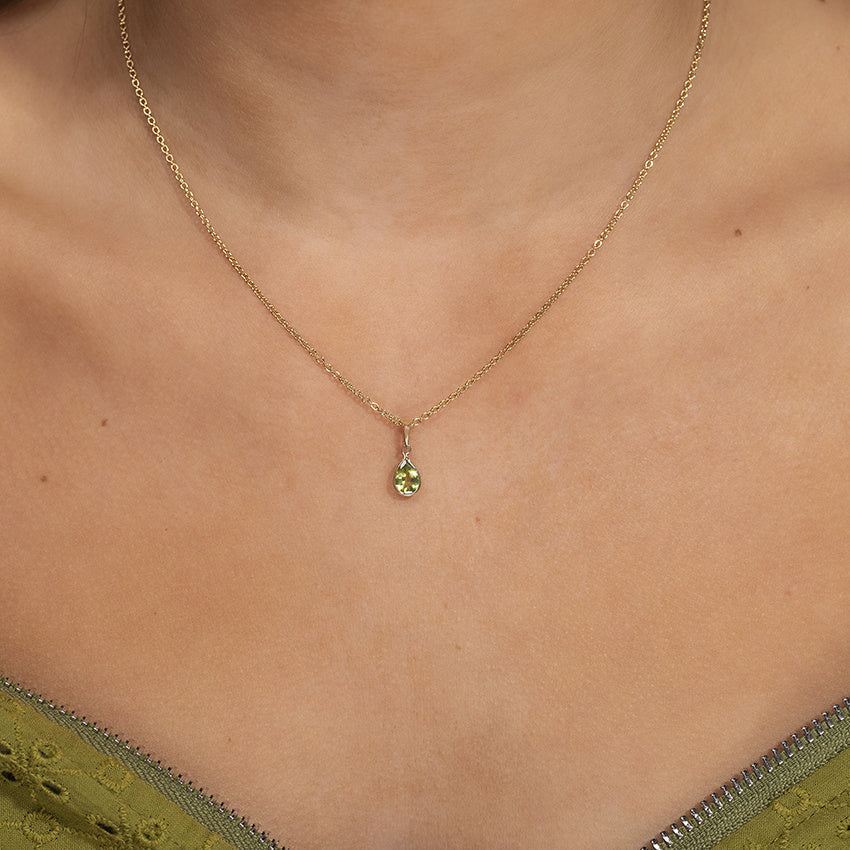 Pendant with peridot 9 kt