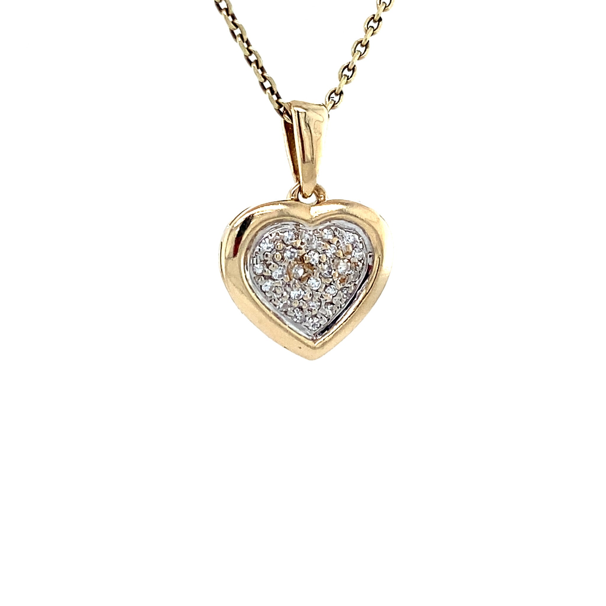 Vintage 14 kt gold heart pendant with diamond.