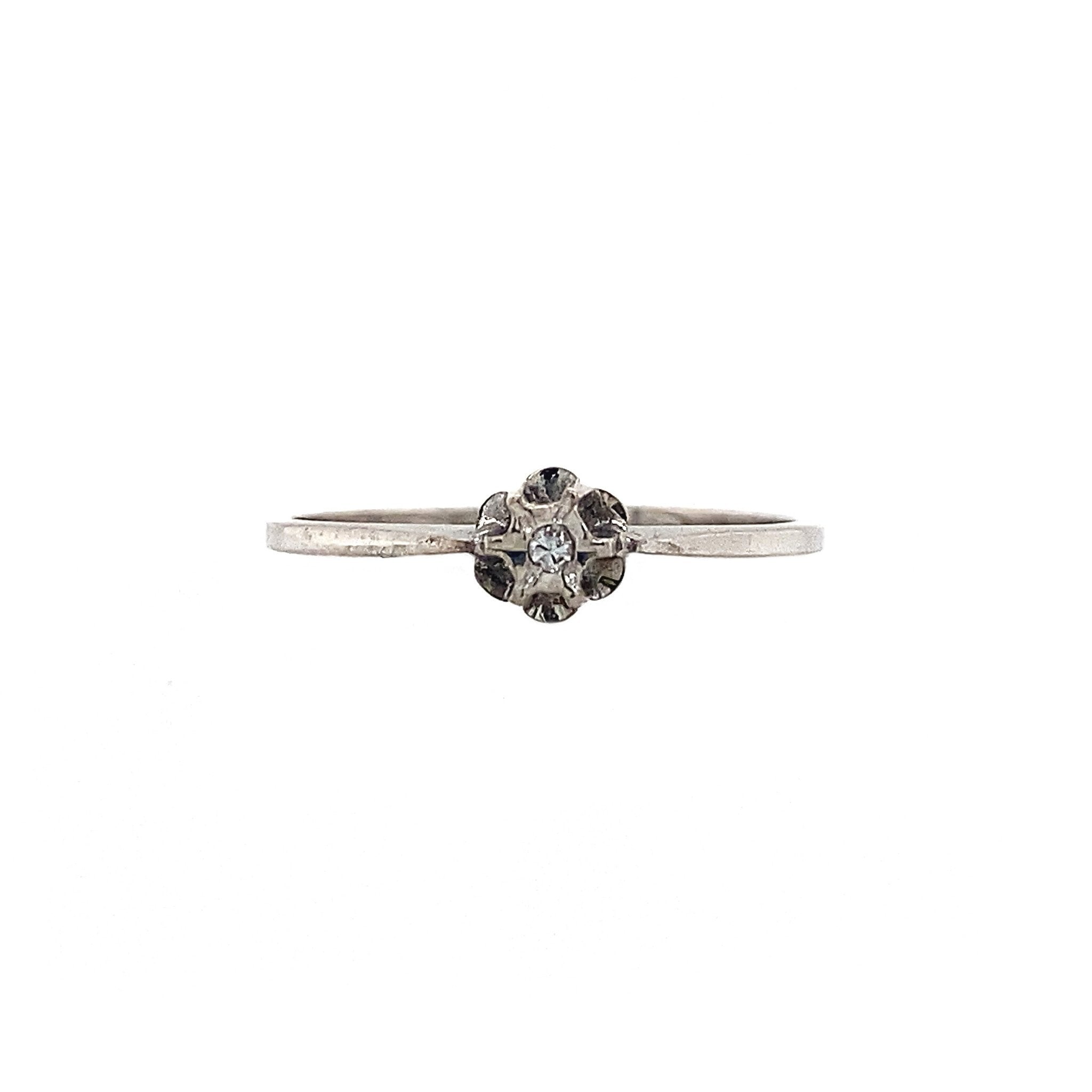 14 kt white gold solitaire ring with diamond