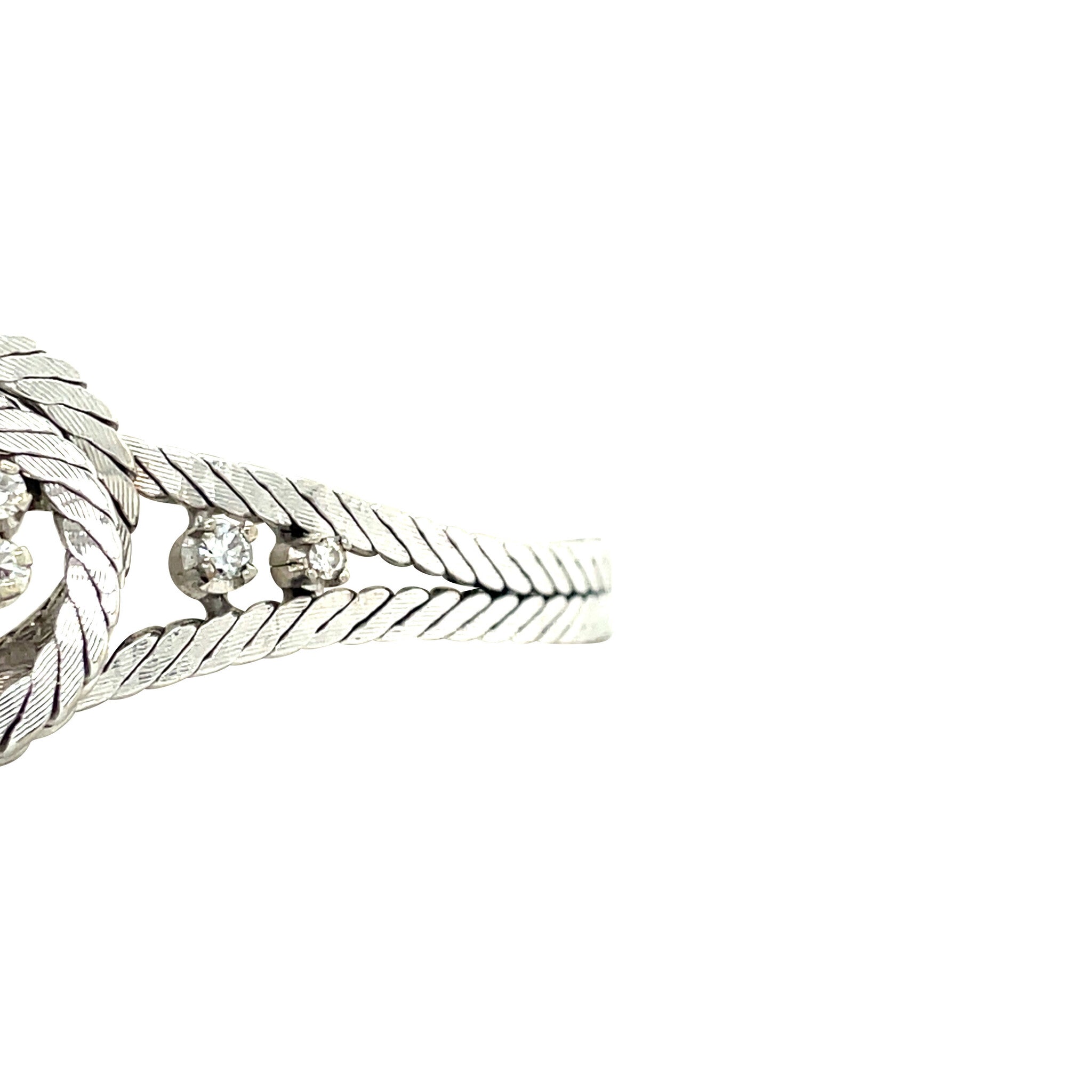 Vintage 14 kt white gold entourage bracelet with diamond