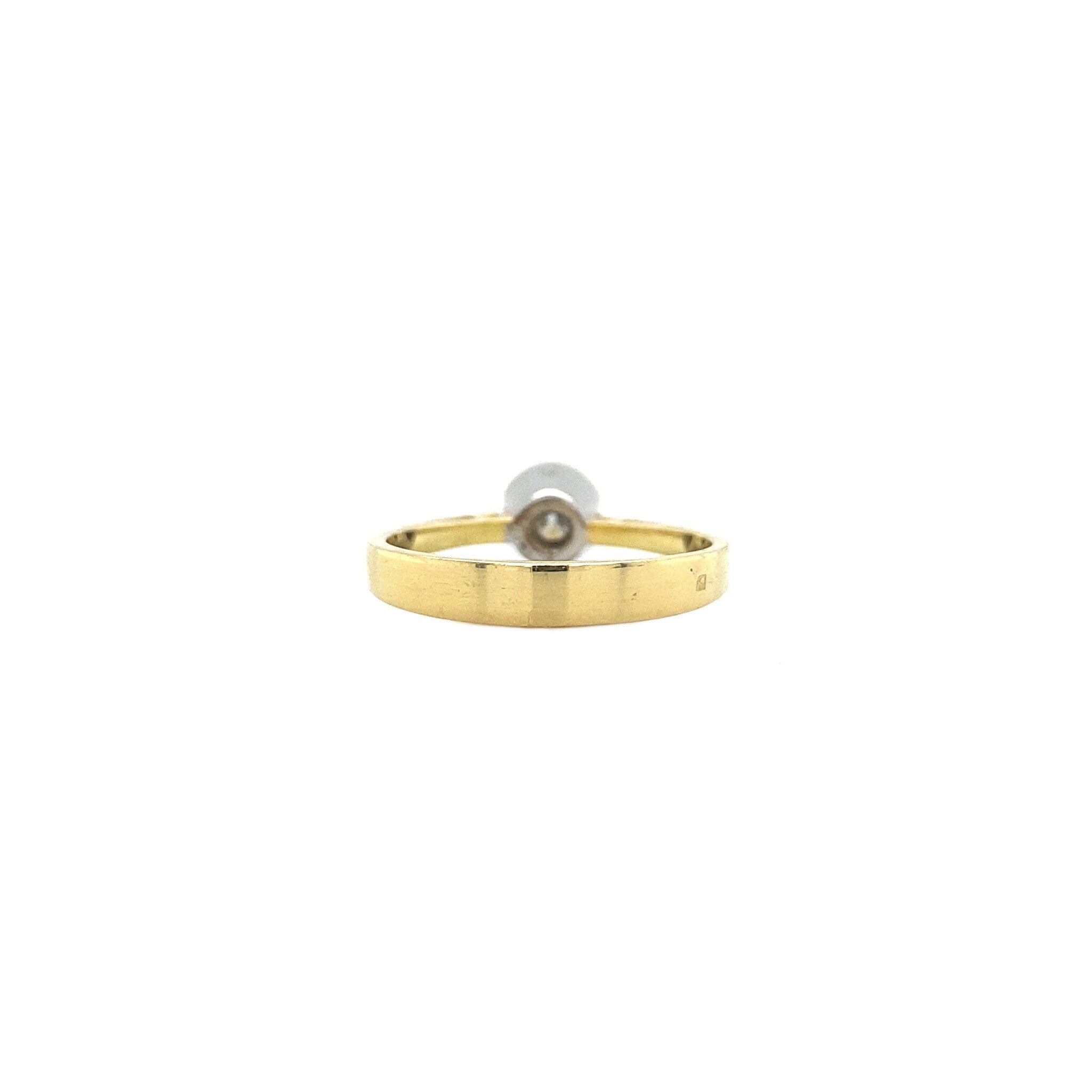 18 kt gold solitaire ring with diamond