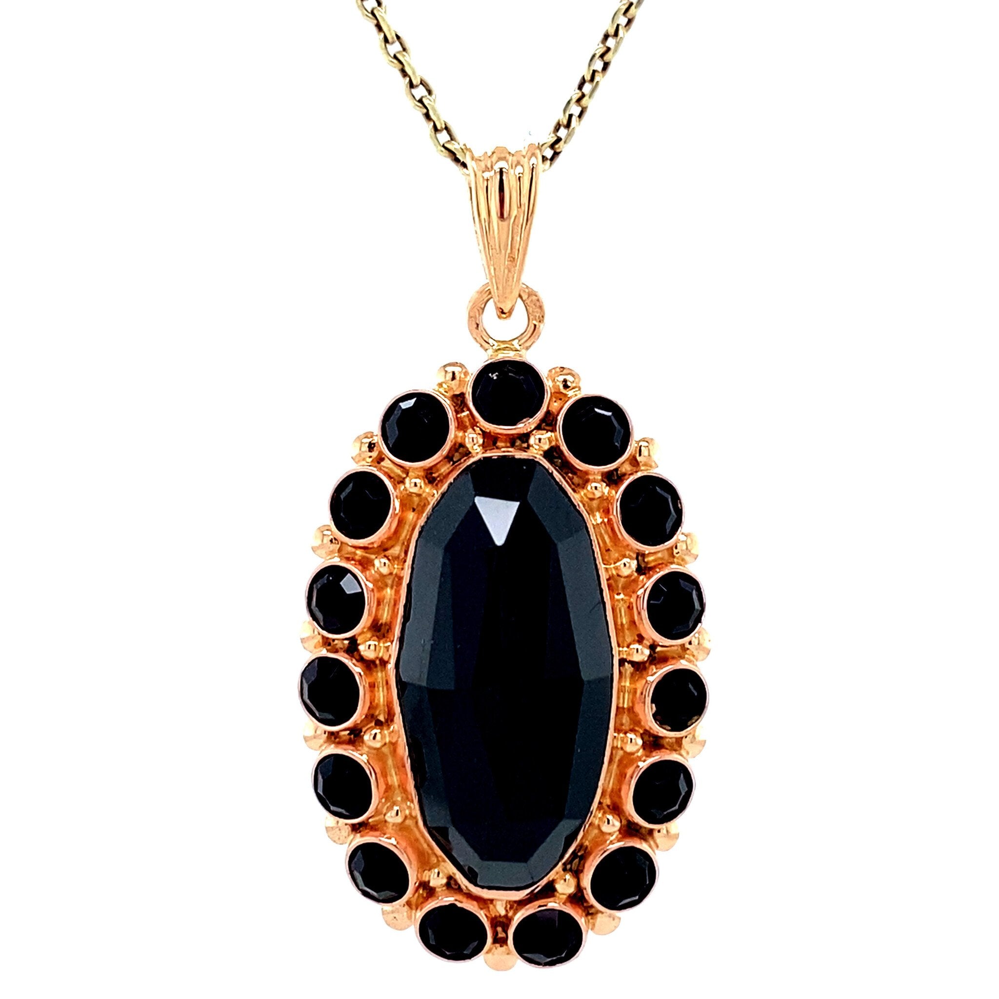 Gold vintage entourage pendant with garnet 14 kt