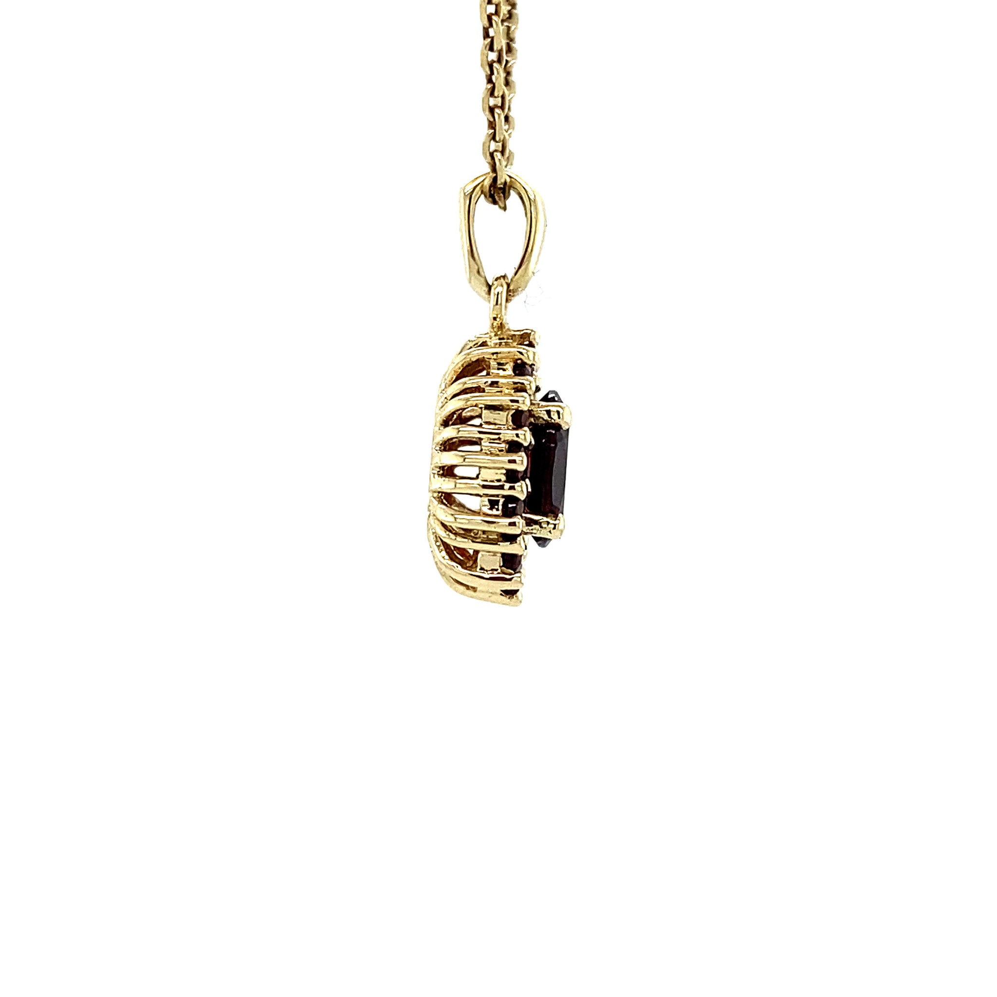 Gold entourage pendant with garnet 14 krt