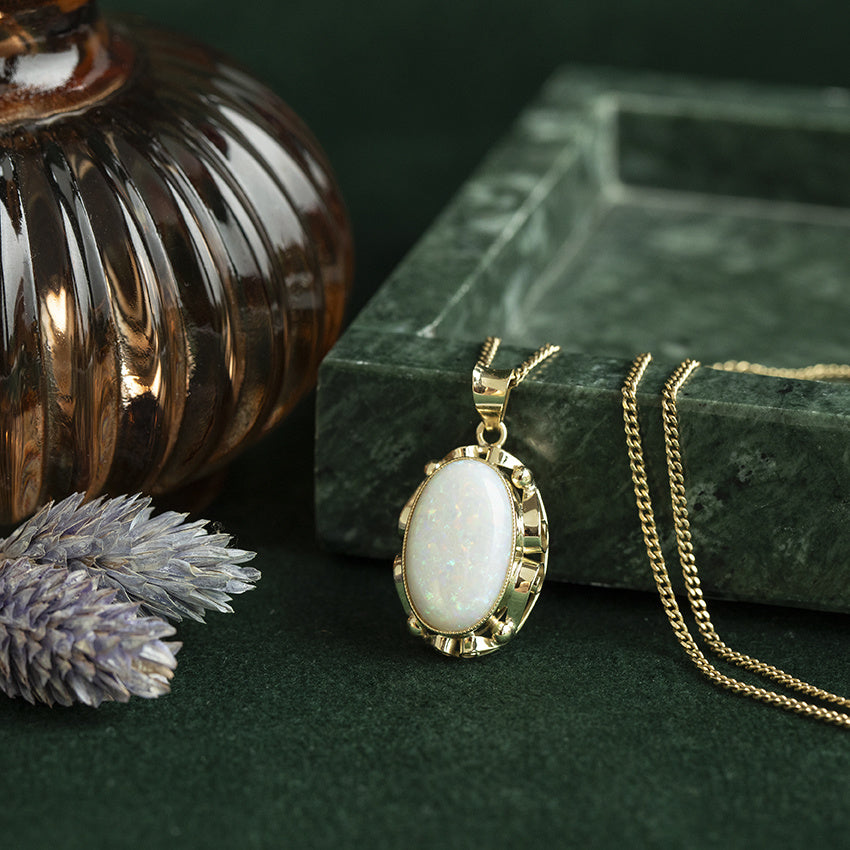Gold vintage pendant with opal 14 kt