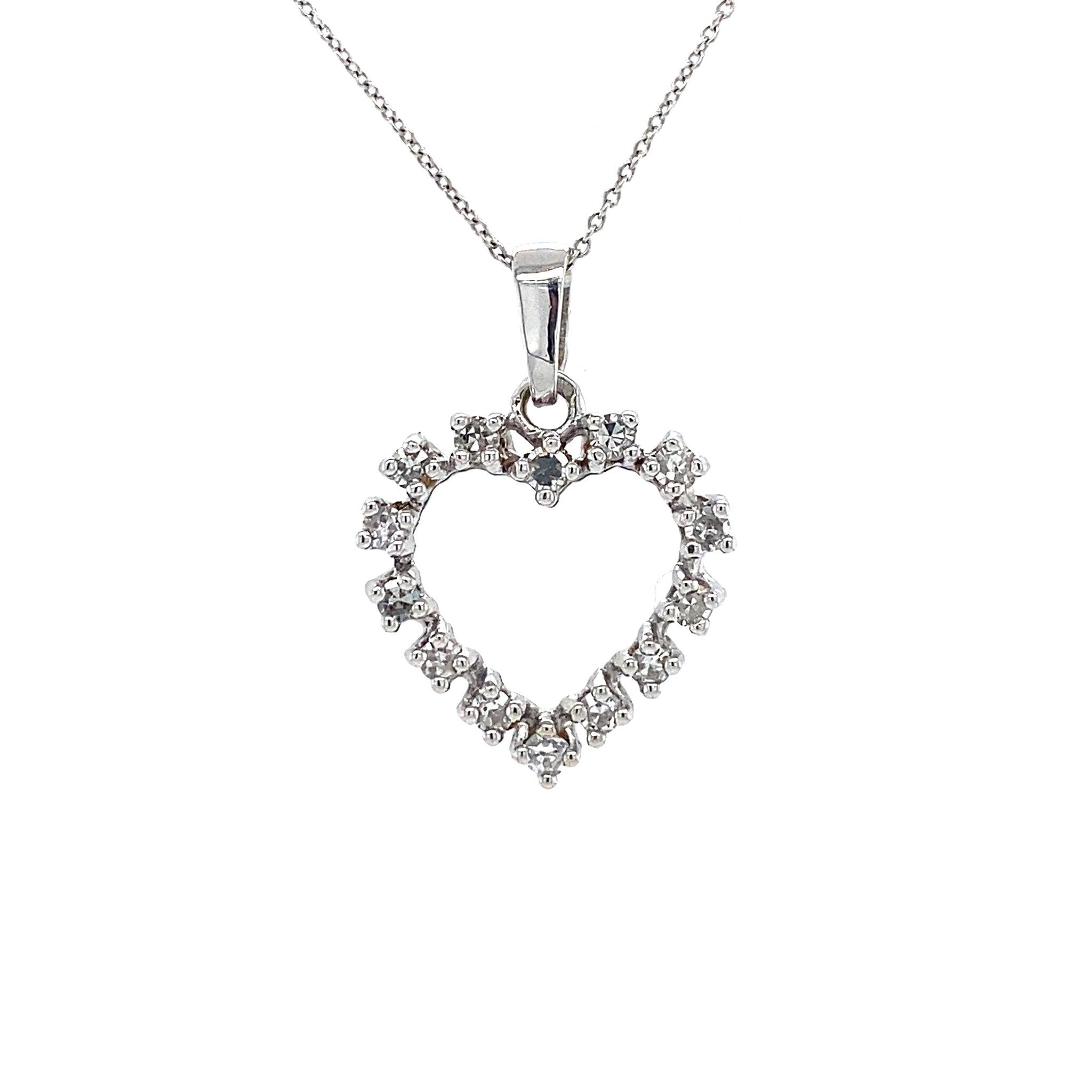 14 kt white gold heart pendant with diamond
