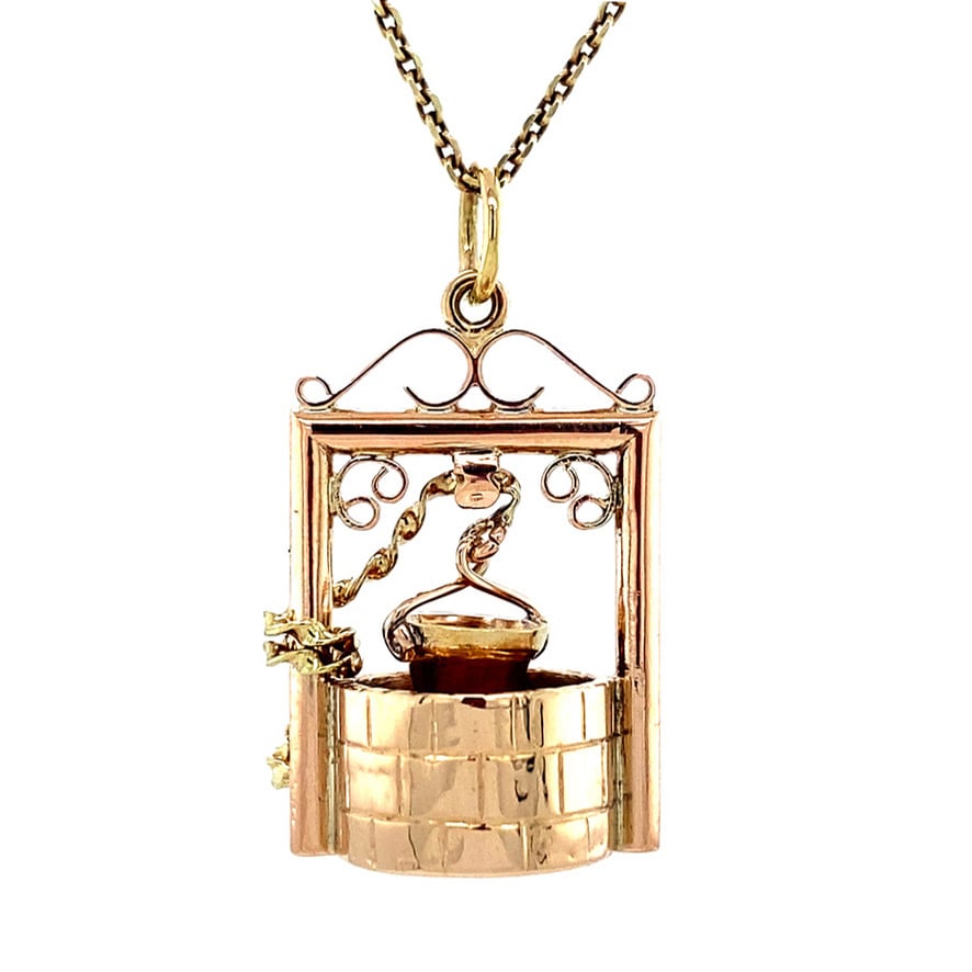 Gold wishing well pendant 14 krt