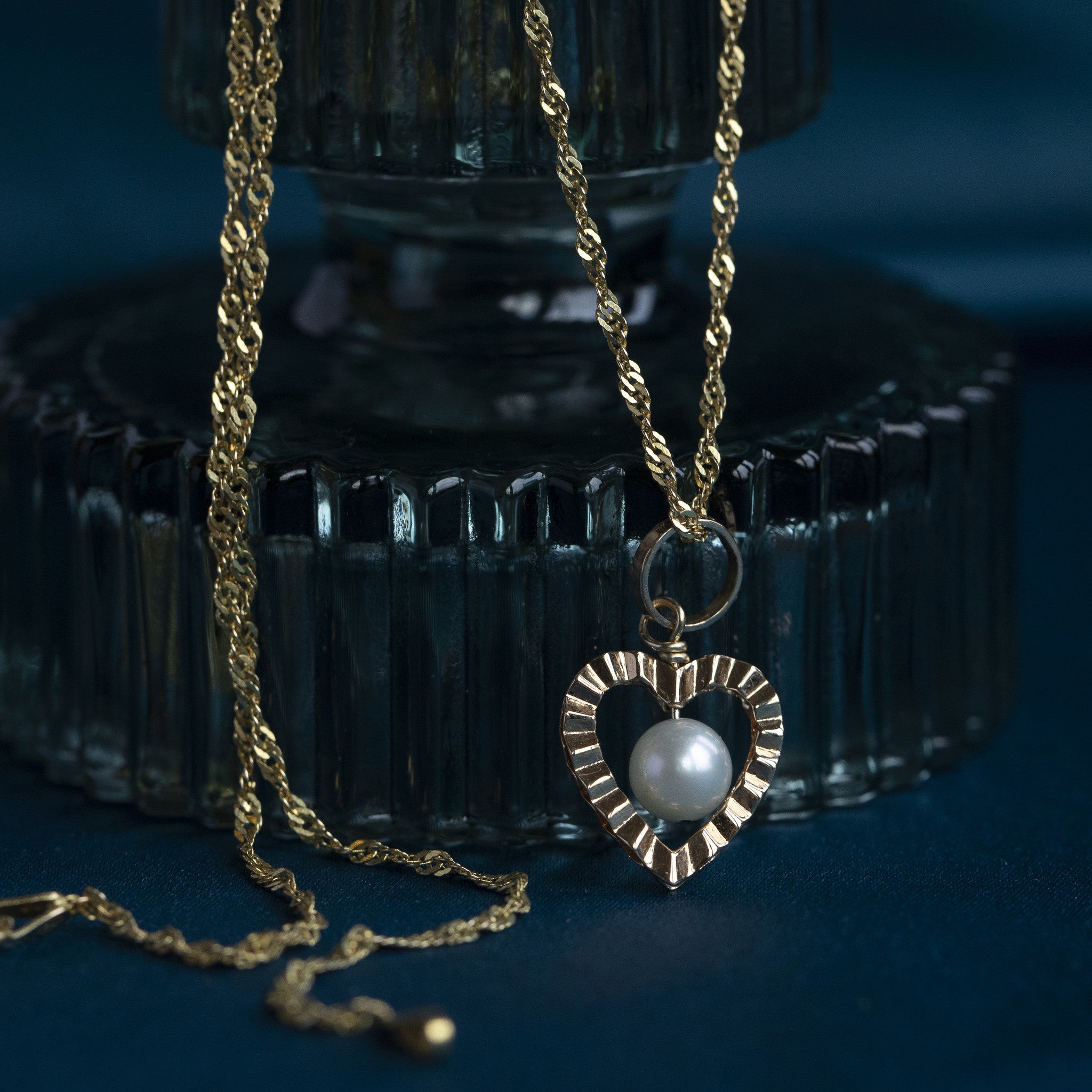 Gouden hanger met parel 18 krt