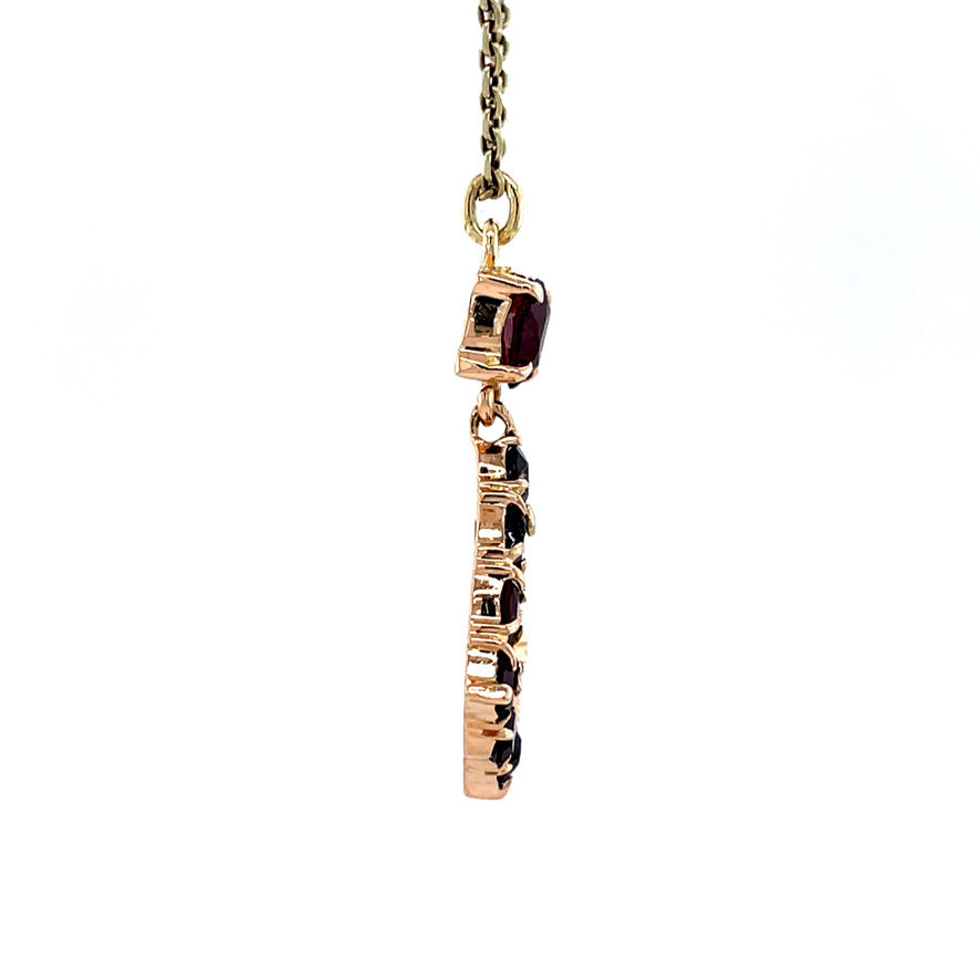 Golden vintage pendant with garnet 18 kt
