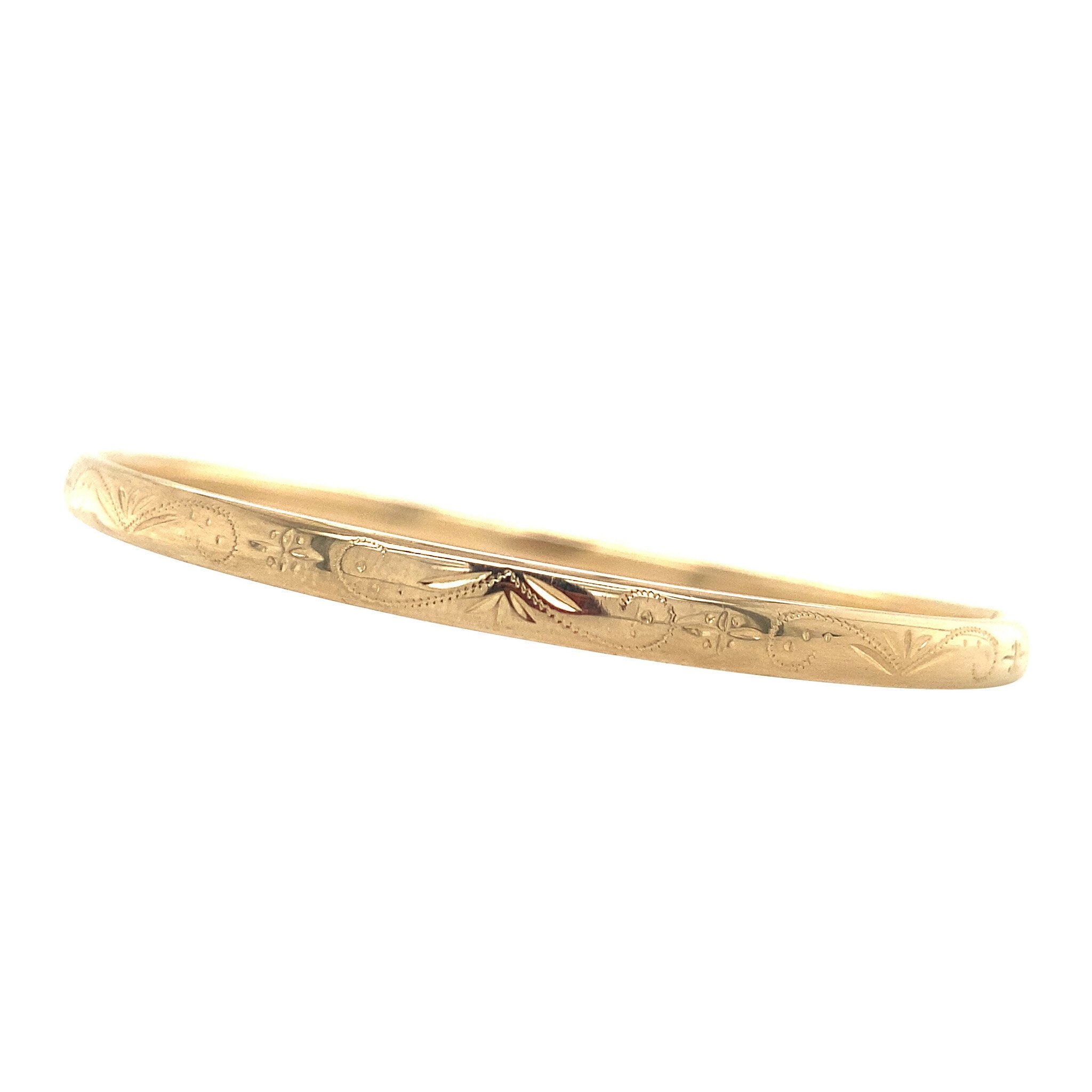 Gold bangle with engraving 14 krt