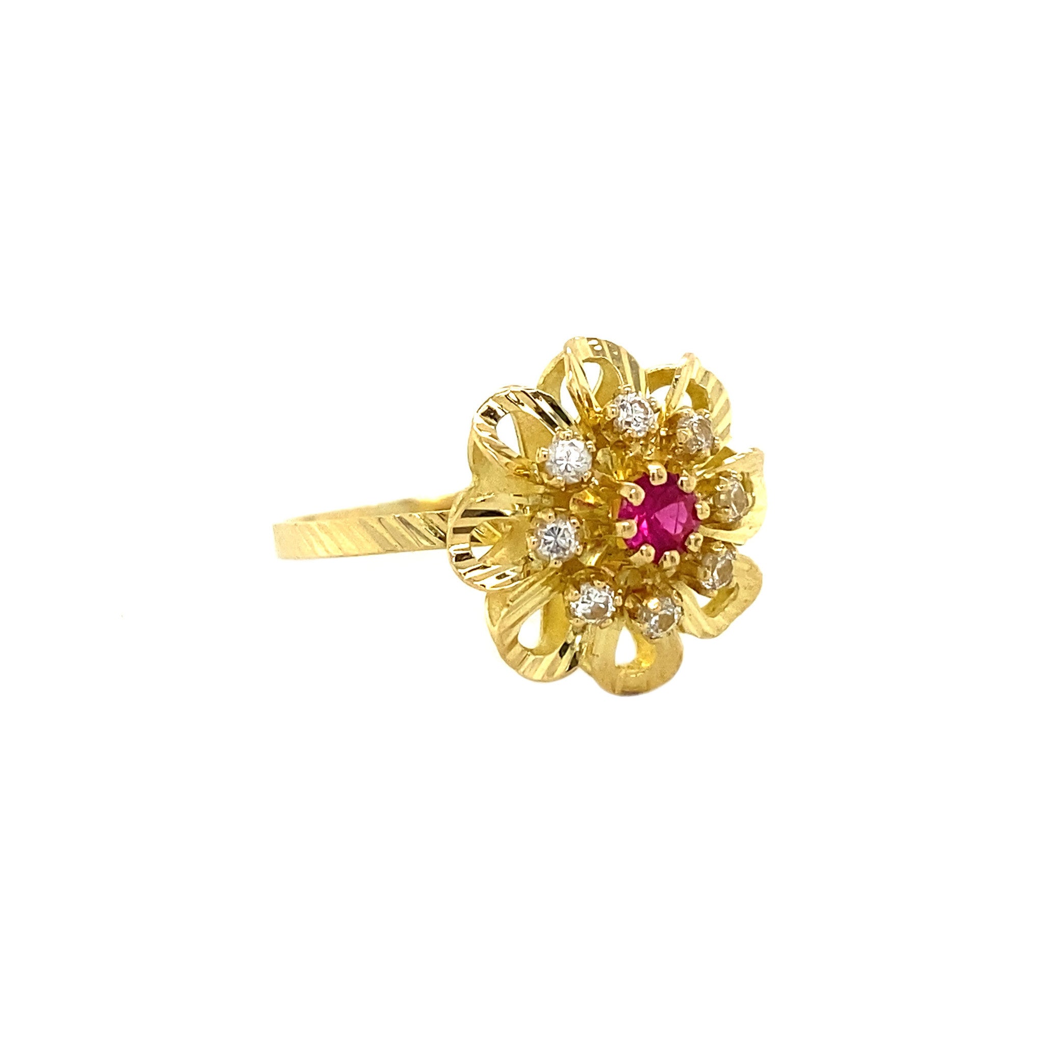 18 kt gold ring with ruby and zirconia