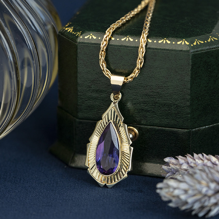 Gouden vintage hanger met saffier 14 kt