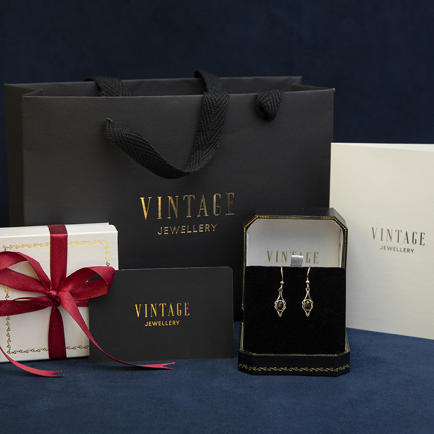 Golden vintage drop earrings with onyx 14 kt