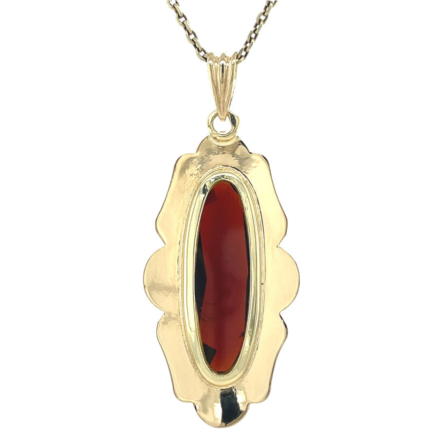 Gold vintage pendant with garnet 14 kt