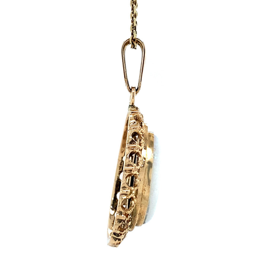 Gouden vintage hanger met opaal 14 krt