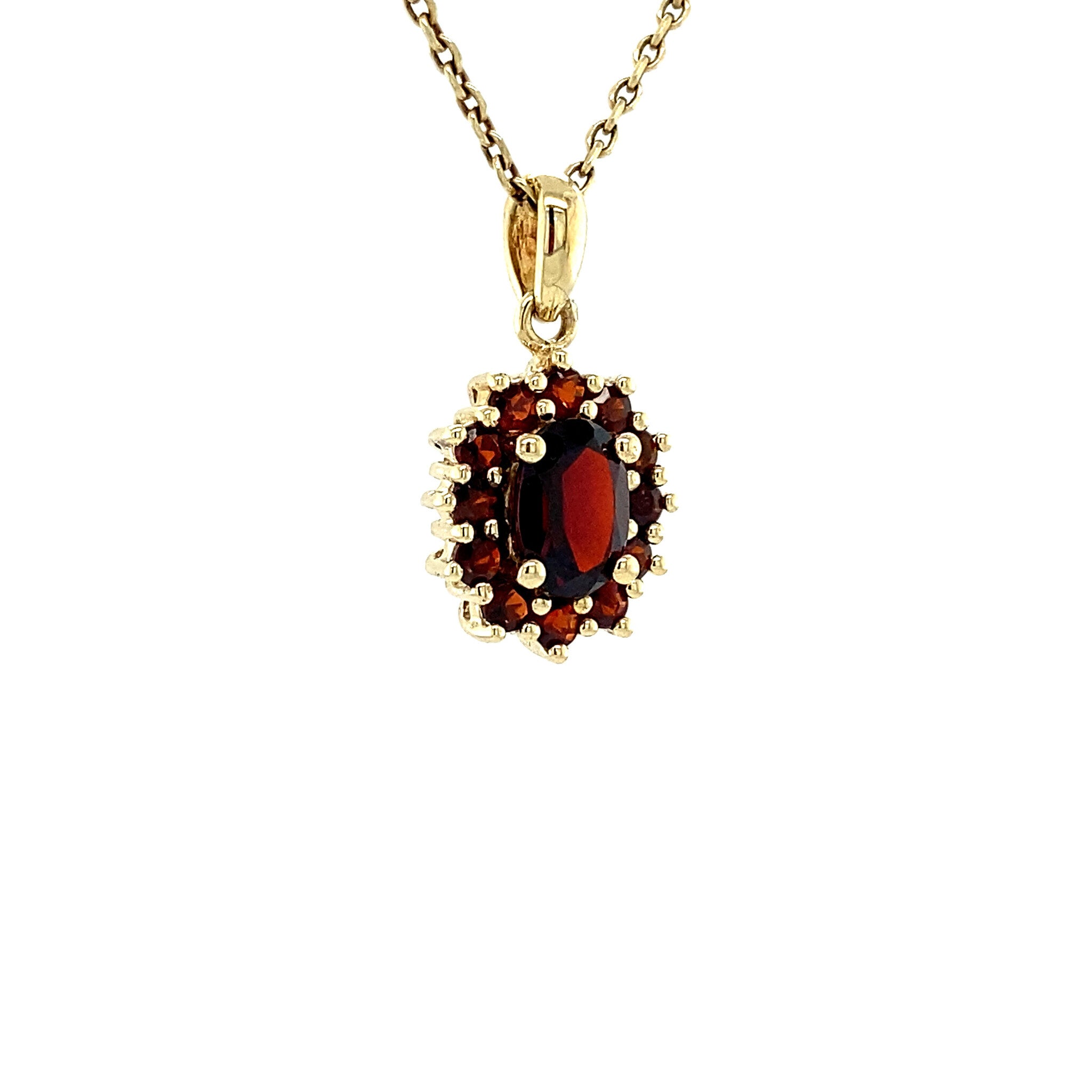 Gold entourage pendant with garnet 14 krt