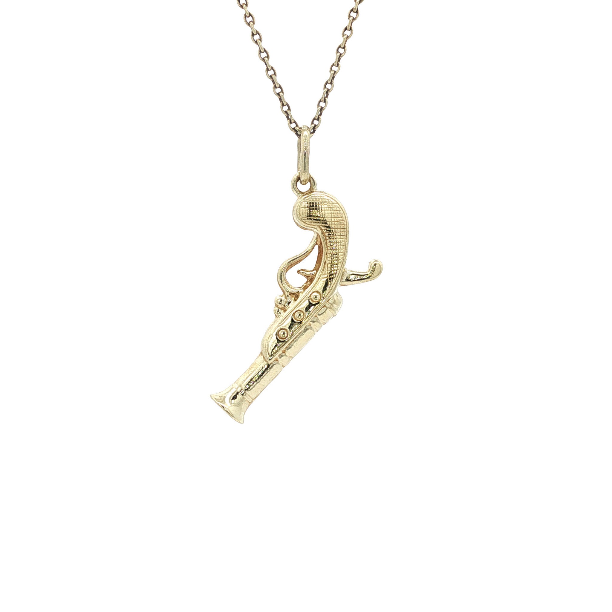 Gold vintage pistol pendant 14 kt