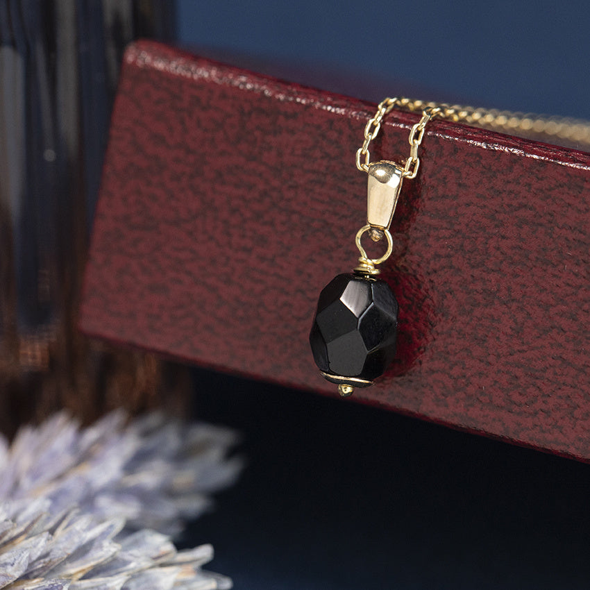 Gouden vintage hanger met kleursteen 14 kt