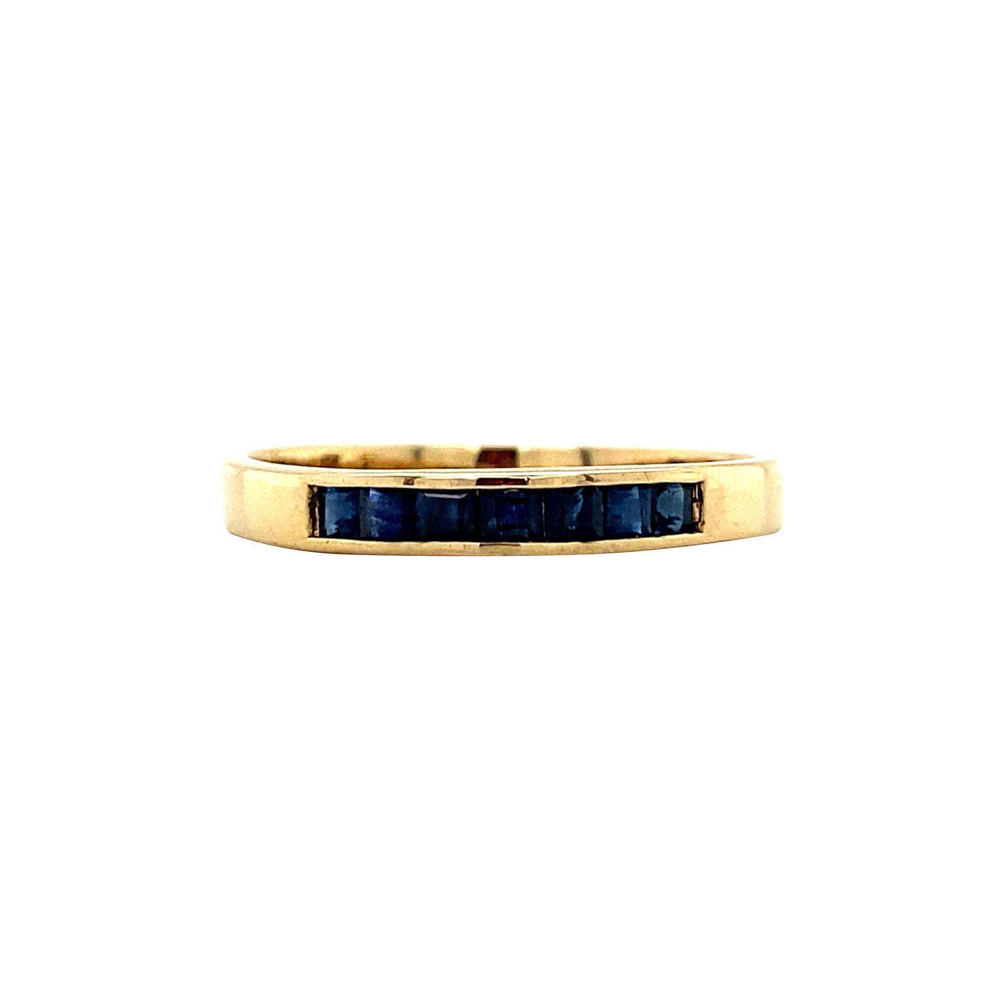 18 kt gold row ring with sapphire