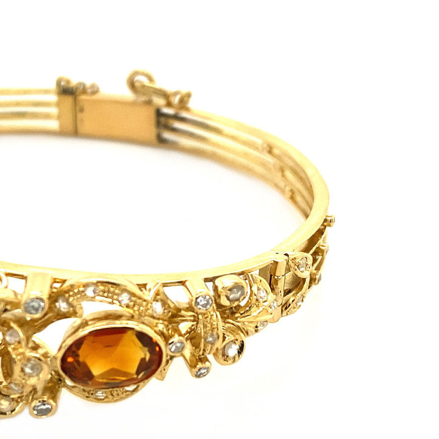 Gouden armband met citrien en diamant 14 krt