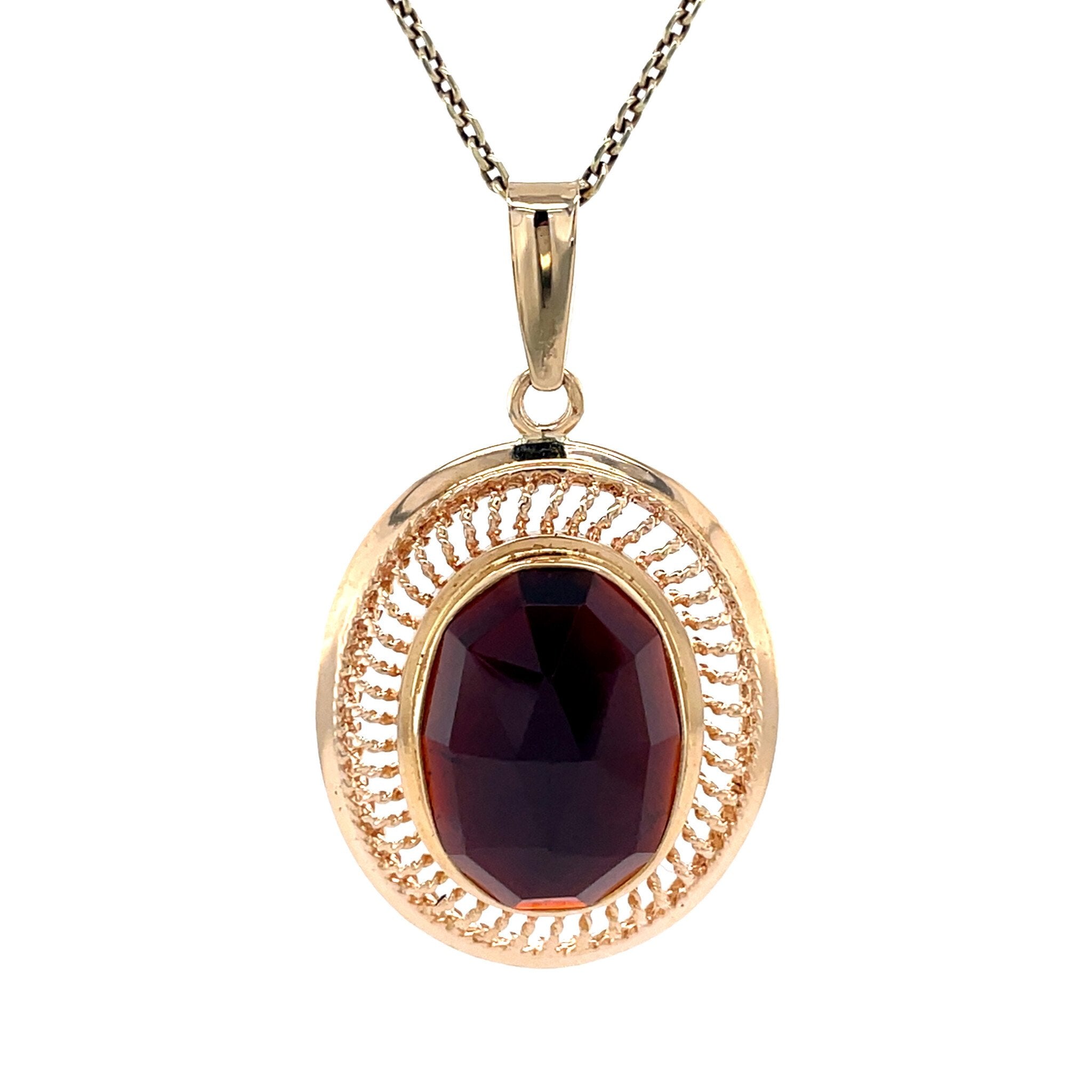 Gold vintage pendant with garnet 14 kt