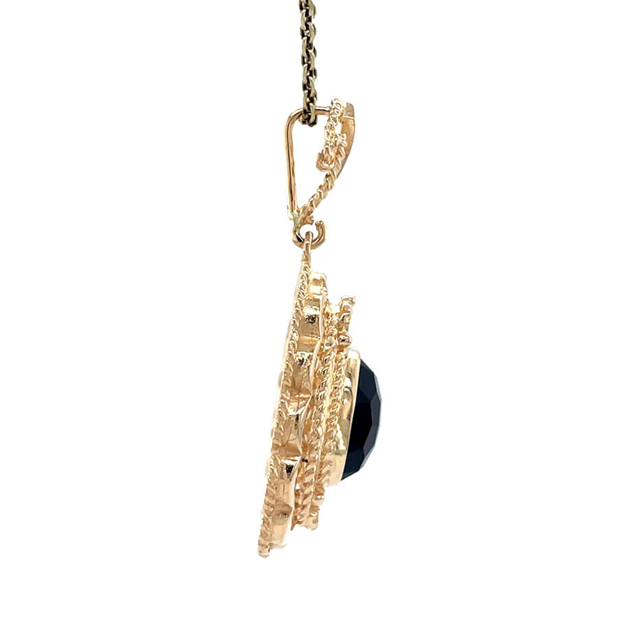 Gold vintage pendant with garnet 14 kt