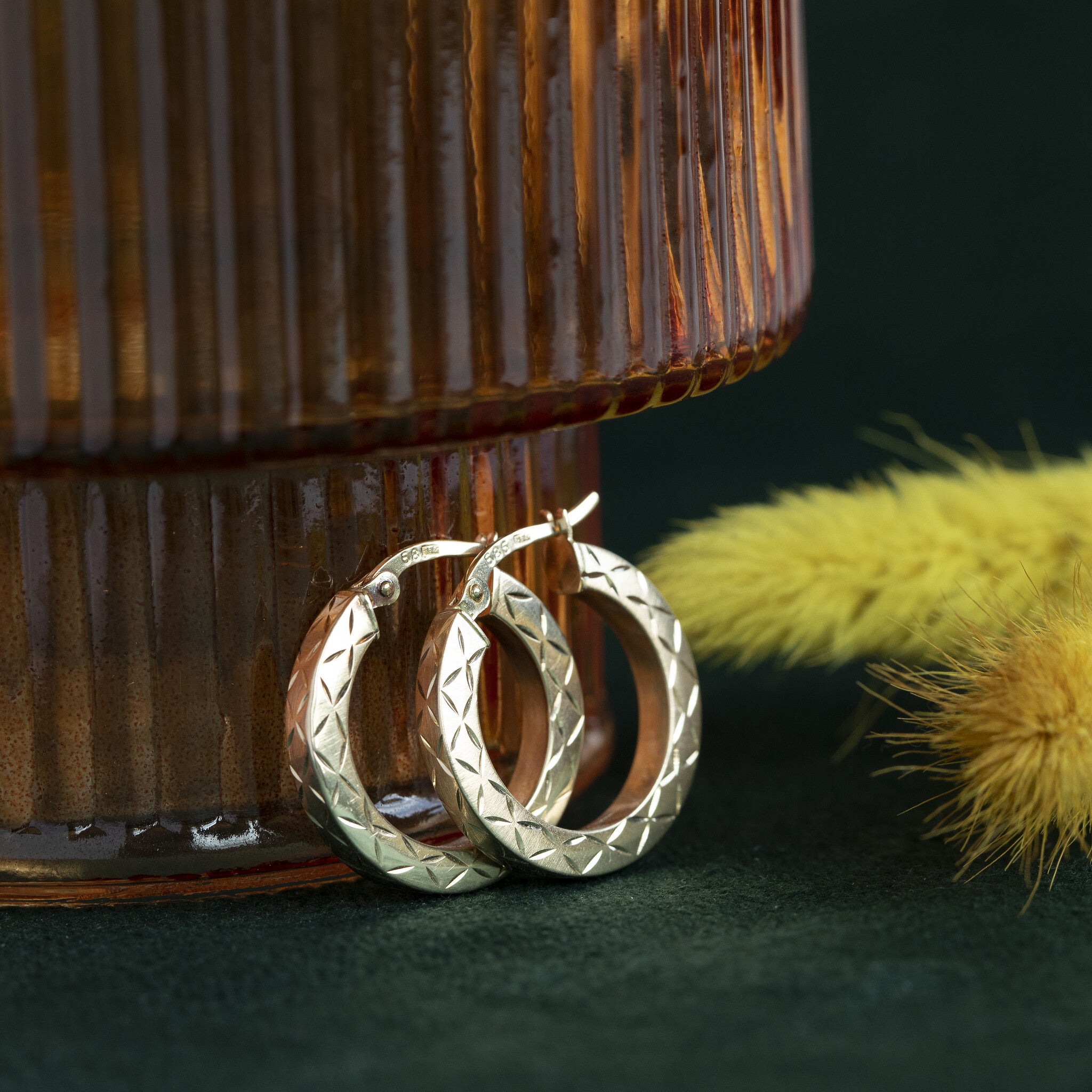 Gouden fantasie oorringen 14 krt