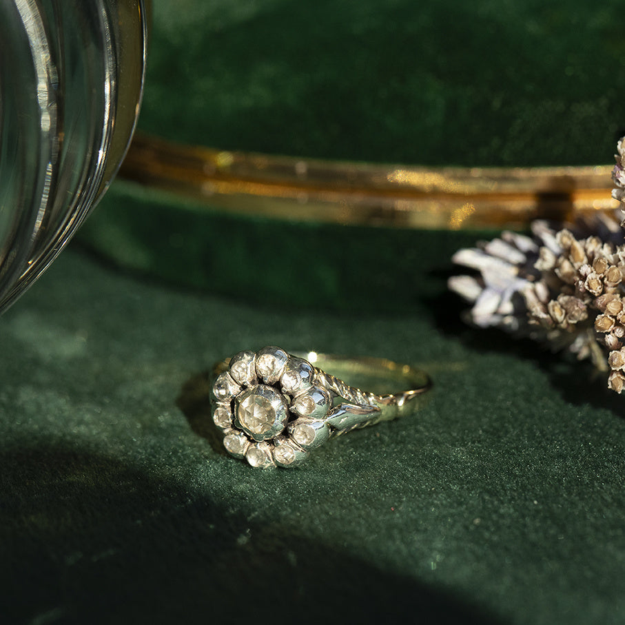 14 kt gold vintage halo ring with a rose-cut diamond