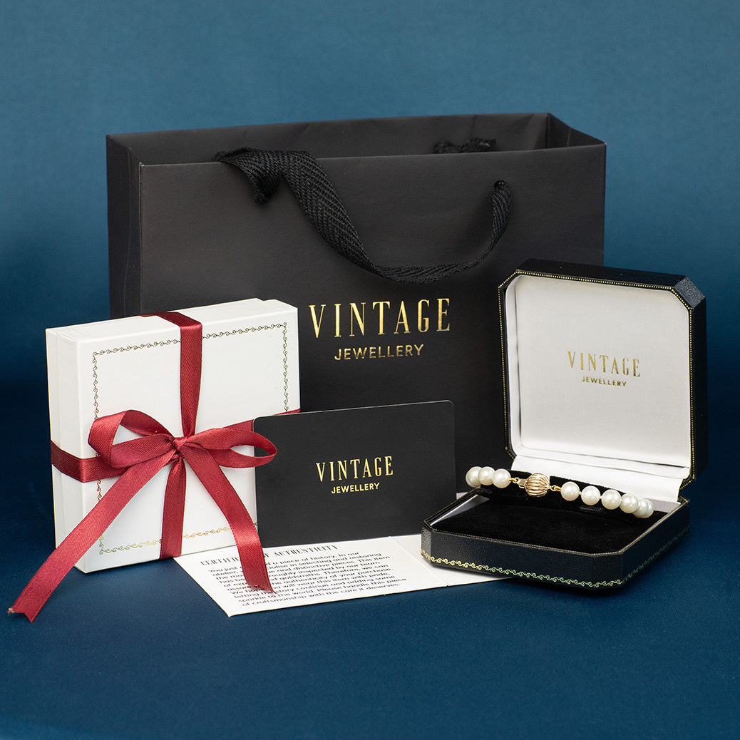 Vintage parelarmband met gouden sluiting 14 krt