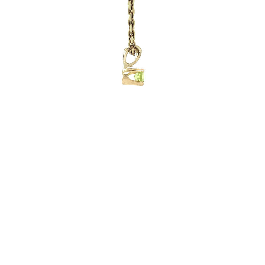 Golden vintage solitaire pendant with peridot 14 kt