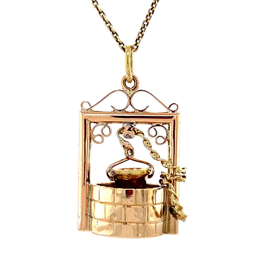 Gold wishing well pendant 14 krt