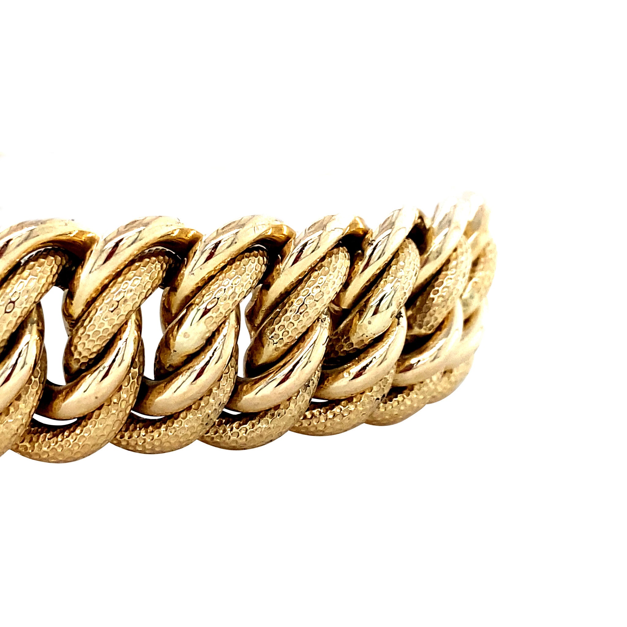 Gold curb bracelet 18 krt