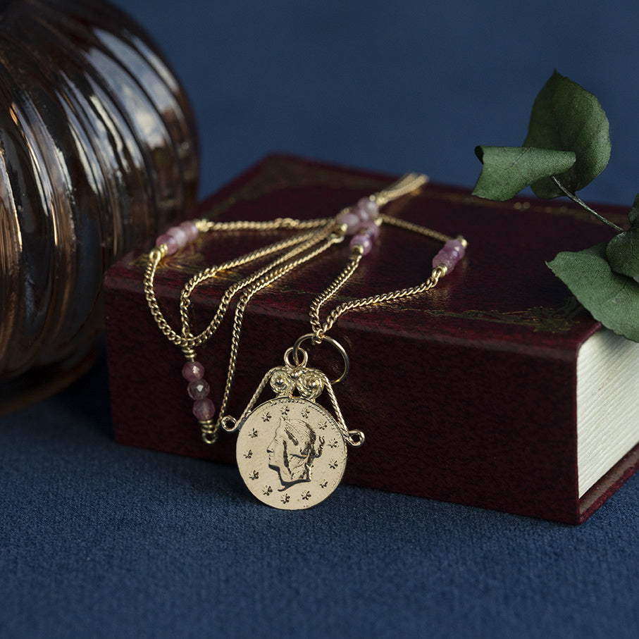 14 kt gold vintage coin pendant