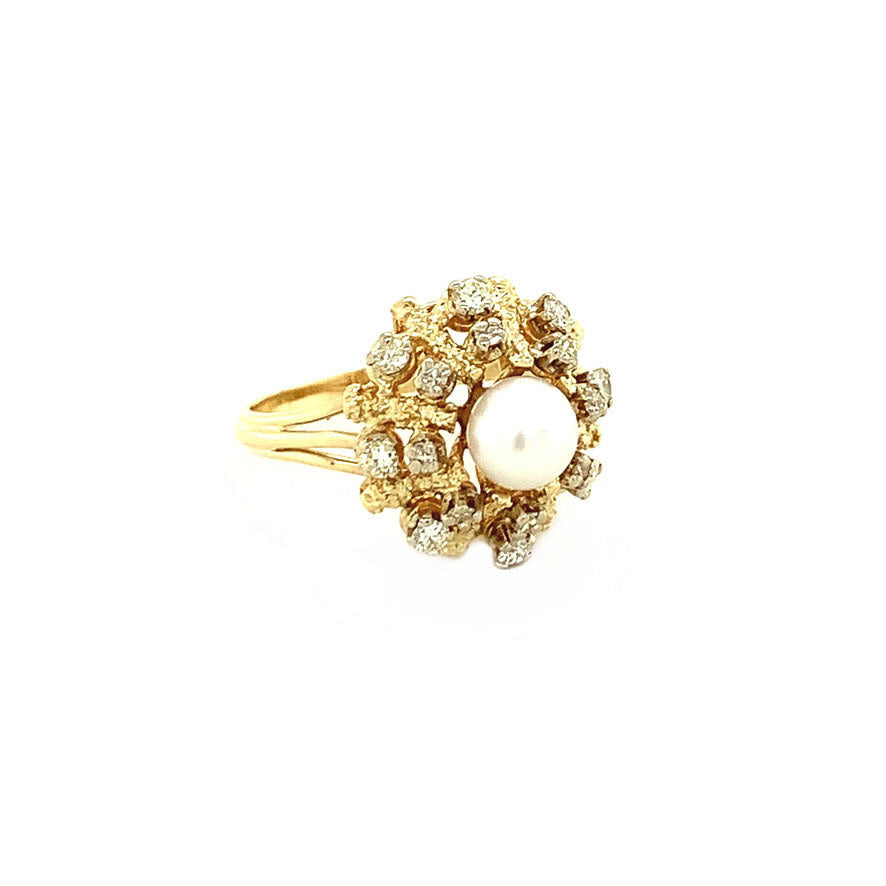 Gouden entourage ring met parel en diamant 14 krt