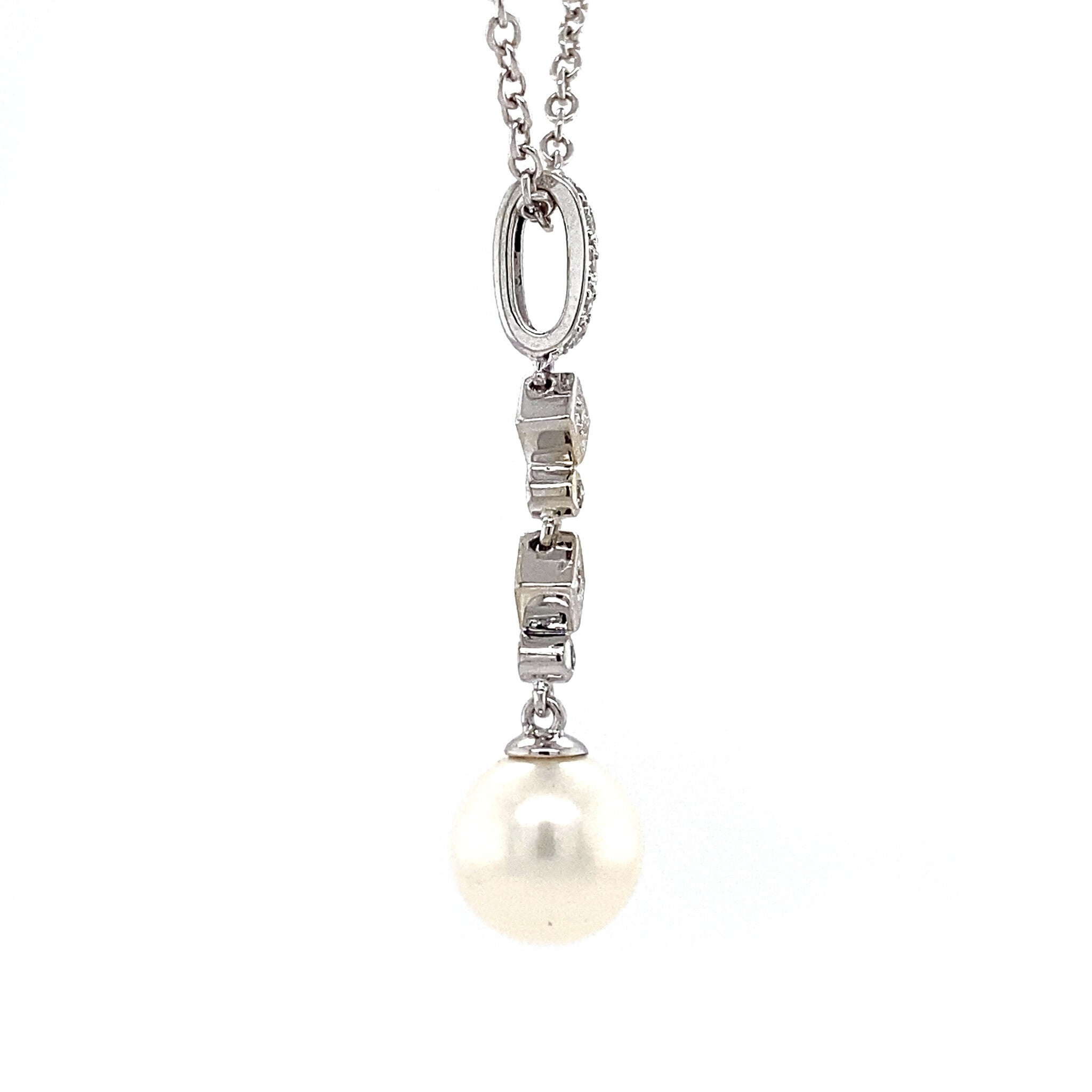 White gold pendant with diamond and pearl 14 krt