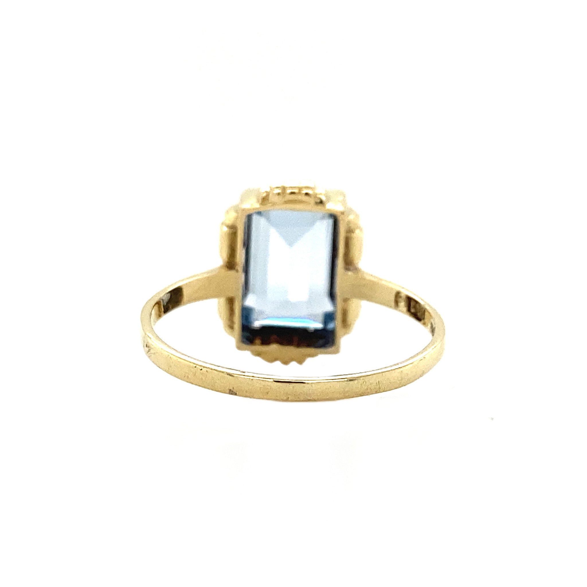 Gouden ring met blauwe spinel 14 krt