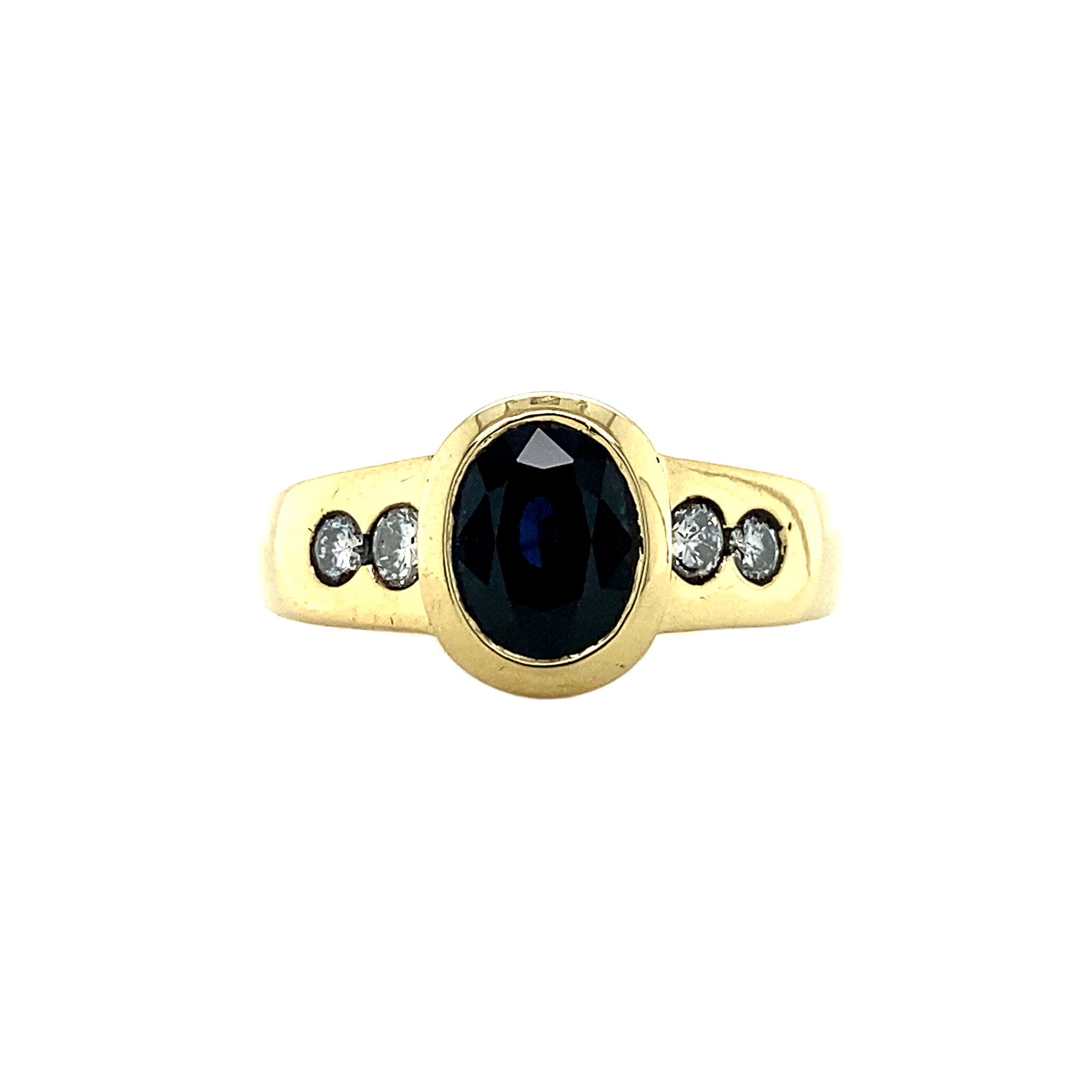 18 kt gold ring with diamond and sapphire