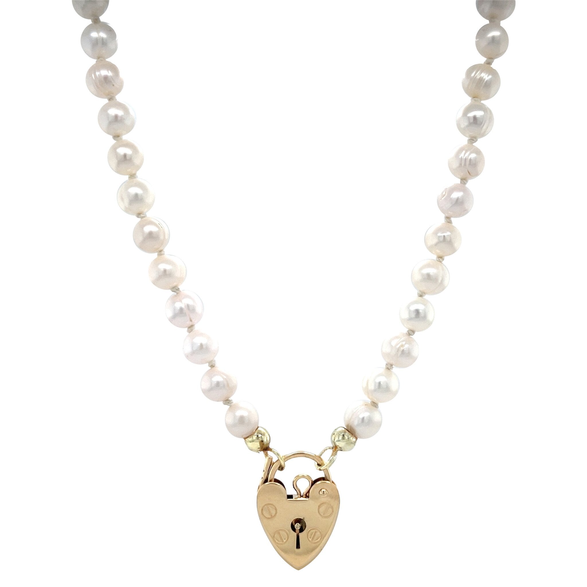 Vintage 9 kt pearl necklace with heart clasp