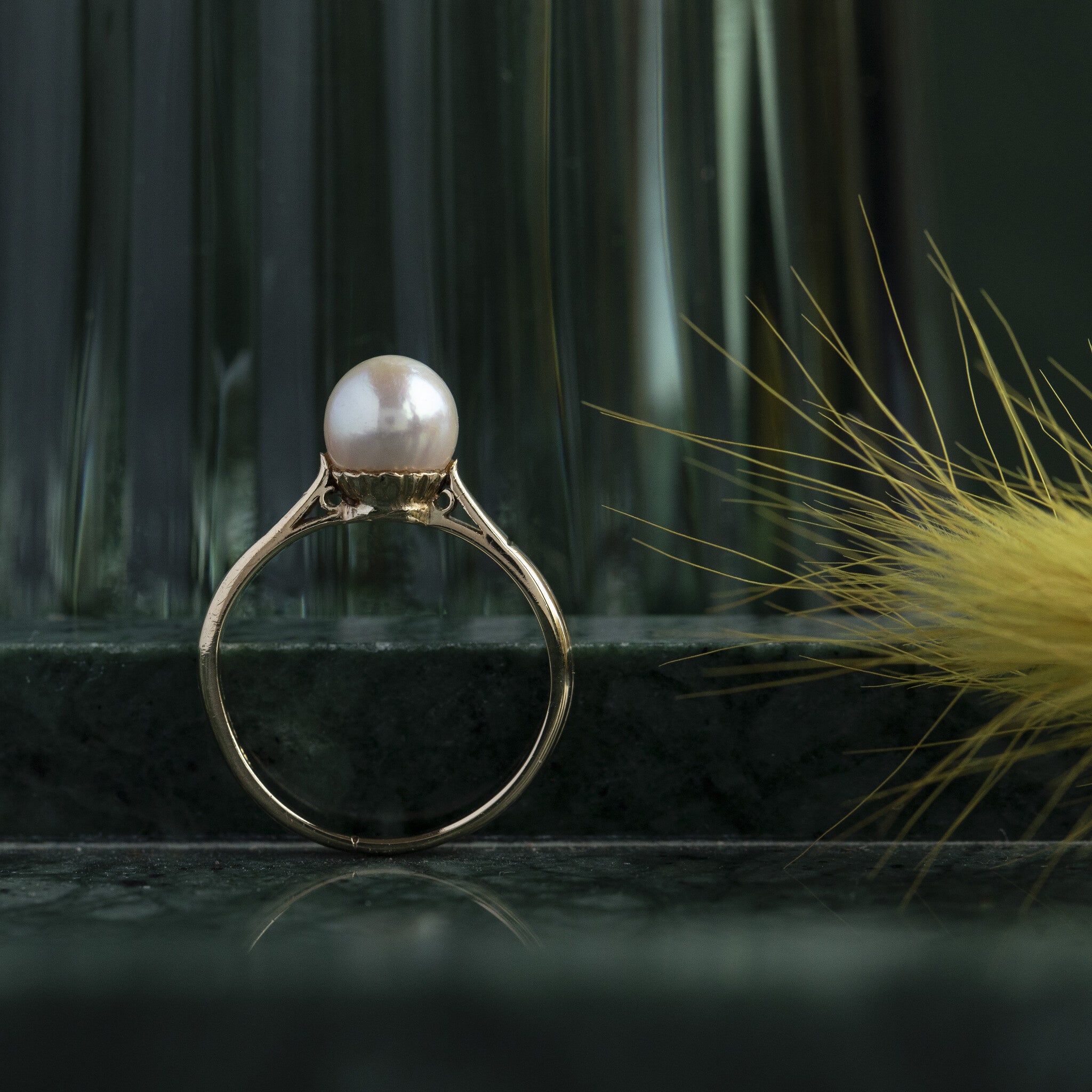 Gouden ring met parel 14 krt